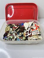 overview of tub with lid off showing assorted buttons