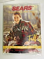 Front cover of sealed catalog showing title and imagery