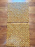 Both square wood bead placemats front view