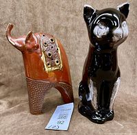 Front view of both figurines showing size and features