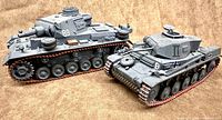 Side view of both Panzer models displaying overall size and weathering detail