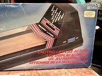 Front angle of console and box end panel showing model number 60-1009