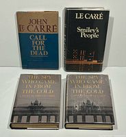 Front view of four John le Carré hardcover books