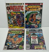 All four bagged Fantastic Four issues front covers