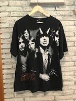 Full front view of AC/DC T-shirt on hanger
