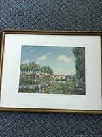 Front view of framed Alfred Sisley print with mat and frame