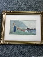 Full view of framed lithograph with ornate gilt frame