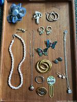 Overall tray view showing all 17 jewelry items