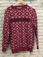 Front view of burgundy Louis Vuitton Supreme monogram sweater