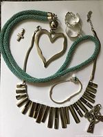 Group shot of all jewelry pieces laid out