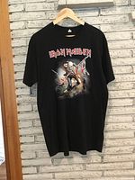 Front view of Iron Maiden T-shirt hanging