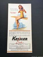 Full view of Kessler Beer pin-up calendar card showing illustration, text and calendar strip
