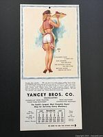 Full view of calendar front showing pin-up artwork, Yancey Bros. Co. text and March 1957 grid