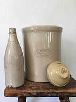 Crock, bottle and bowl grouped together