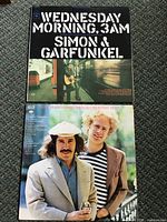 Front covers of both Simon & Garfunkel LPs