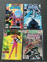 All four bagged comic books laid out