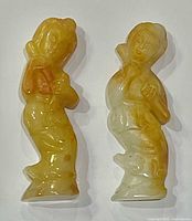 Front view of both jade female figurines