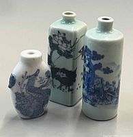 Three snuff bottles front view showing overall shapes and patterns