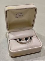 Ring in presentation box showing stone pattern