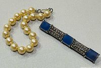 Bracelet and brooch together overview