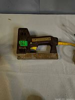 Full view of Arrow ETF-50 electric tacker left side