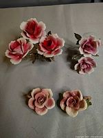 Front view showing all four porcelain rose pieces