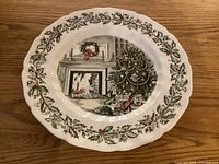 Front of Johnson Bros Merry Christmas plate showing design