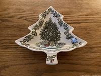 Front view of Johnson Bros Merry Christmas tree-shaped dish