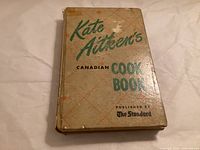 Front cover of hardcover cookbook showing title and publisher