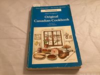 Front cover showing title, author, illustrator and third printing note