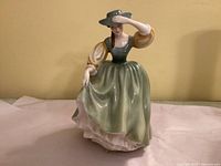 Front view of Royal Doulton Buttercup HN2309 figurine