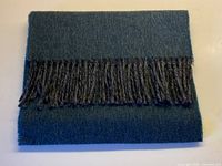 Folded scarf showing colour and fringe