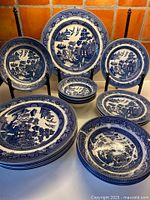 Front view showing all plates and bowls arranged