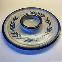 Full view showing overall design and attached dip bowl