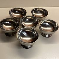 All six stainless steel footed bowls group view