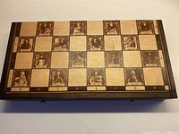 Closed folding chessboard showing portrait squares