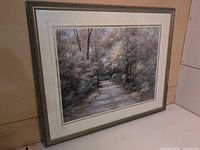 Full view of framed landscape print showing mat and frame details