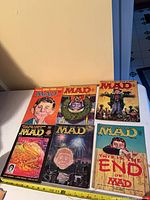 All six Mad Magazine issues laid out face up