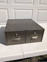 Front view of closed two-drawer steel card catalog