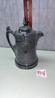 Full view of Reed & Barton silver-plated pitcher