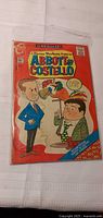 Front cover of Abbott and Costello No.22 comic in plastic sleeve