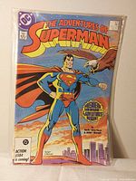 Front cover of The Adventures of Superman comic in sleeve