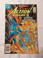 Front cover of Action Comics #550 featuring Superman and title graphics
