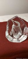 Front view of crystal penguin paperweight