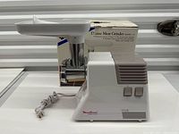 Full view of Moulinex HV6 meat grinder with tray and box