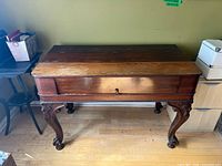 Front view of spinet desk closed