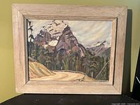 Full view of framed painting showing artwork and frame