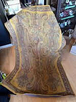 Full view of woven tapestry laid out