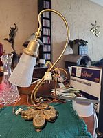 Full view of brass lamp with shade