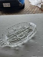 Top perspective of clear pressed glass divided relish dish